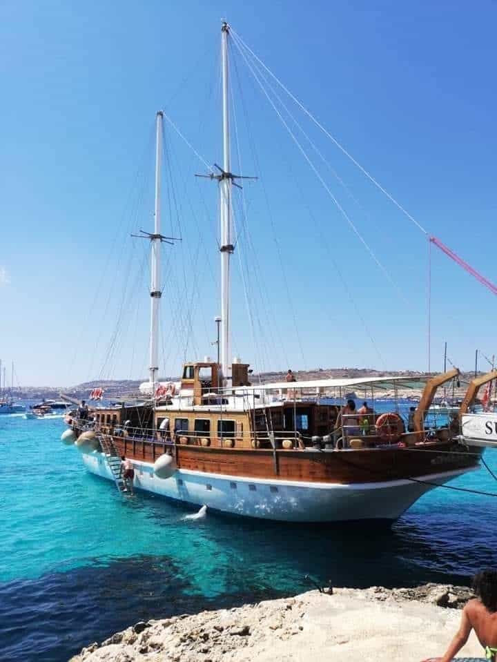 Beautiful wooden yacht Comino cruise